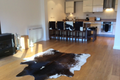 Black and white cowhide stools.