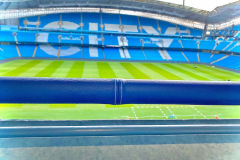 Leather handrails in seating area at Manchester City ground