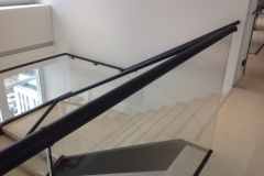 Continuous length of leather covered handrail