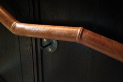 Wall mounted leather handrail