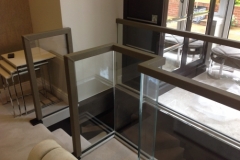 square handrail on glass balustrade.