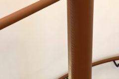 Hand-stitch finish to staircase column.