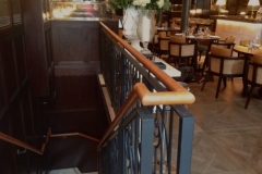 Tan leather handrail in Dover Street, London Restaurant