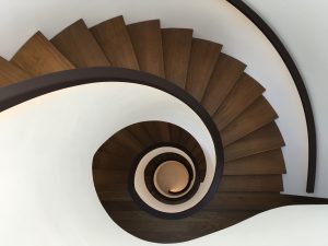 spiral staircase leather handrail